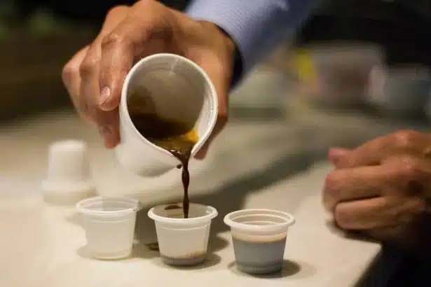 a person puring colada coffee in mini cups