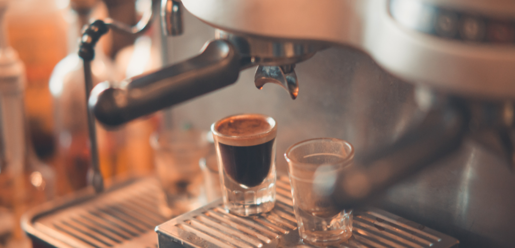 coffee shot being brewed with espresso machine