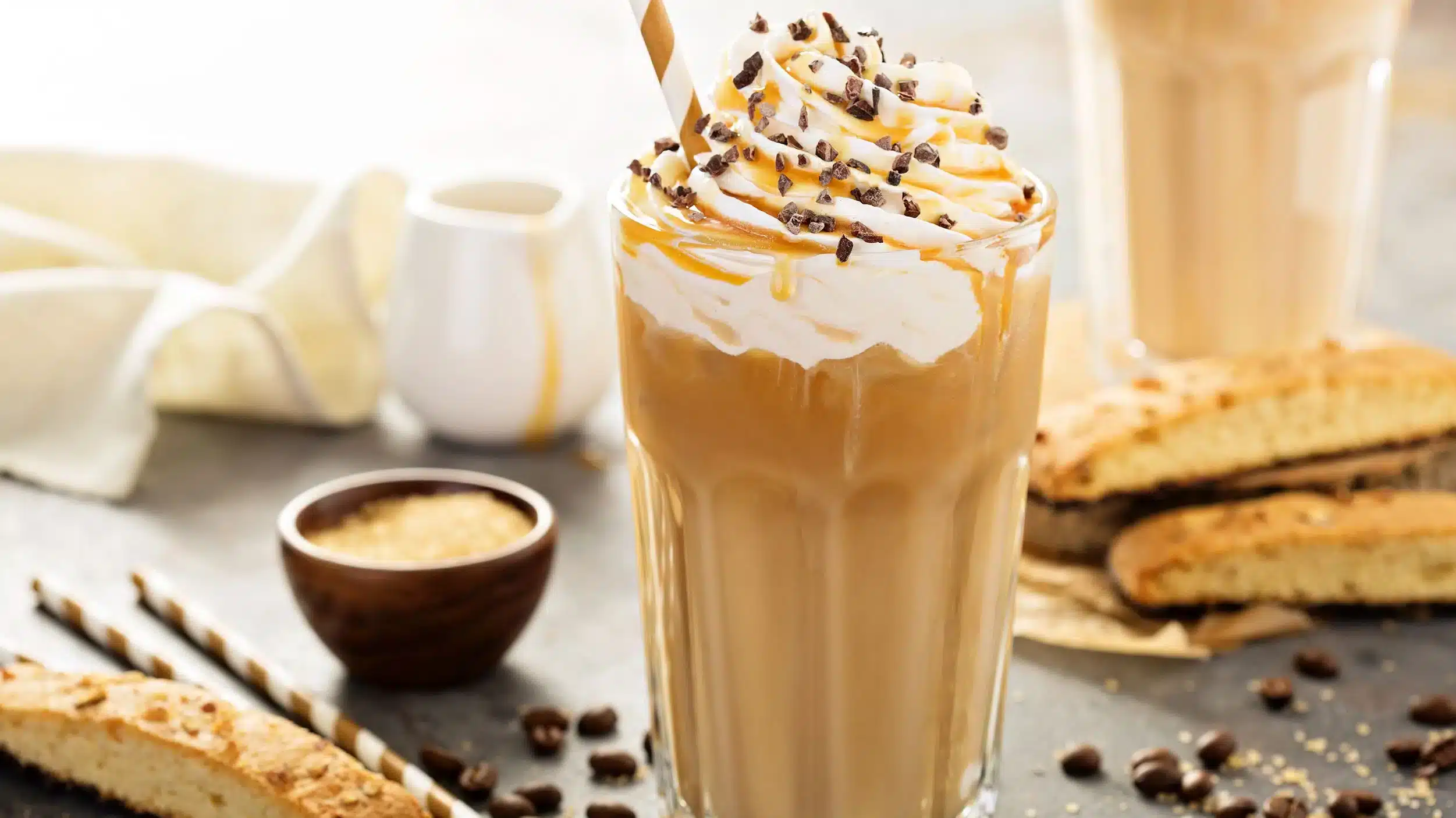 glass of frozen coffee topped with whipped cream