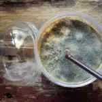 mold in glass of coffee