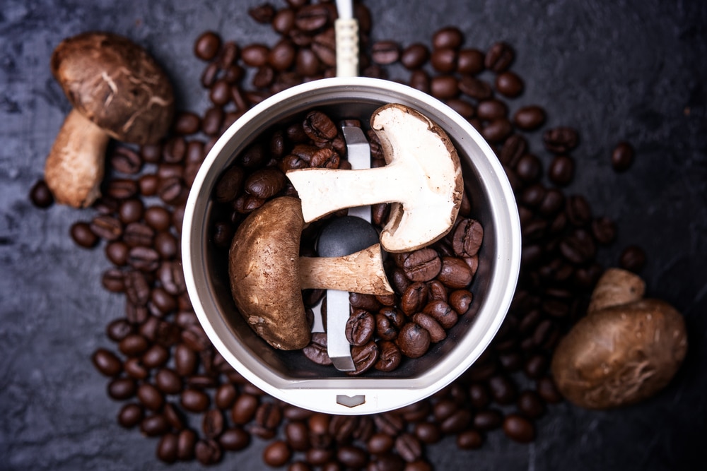 Shiitake Mushrooms With Coffee Beans In A Coffee Grinder On