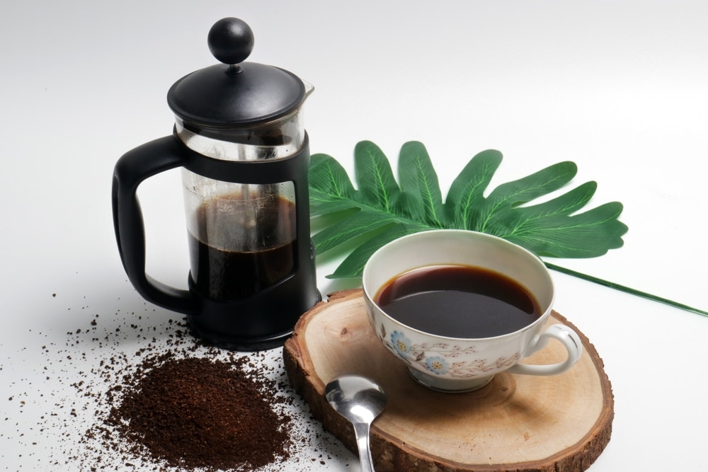 Photo Studio Of French Press Coffee With Cup Of Coffee