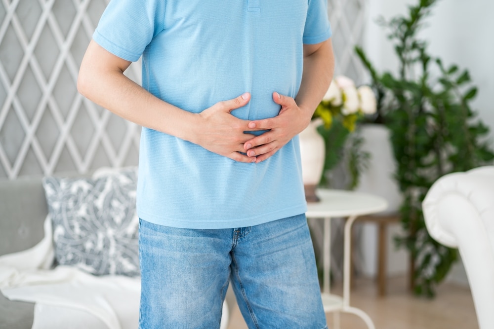 Stomach Ulcer Bloating Man With Abdominal Pain Suffering At Home